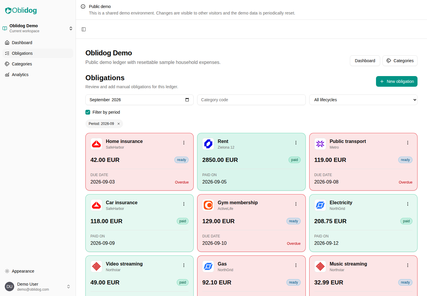 Desktop obligations view in light mode with filters and payment cards